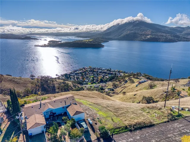 a view of a backyard of the house