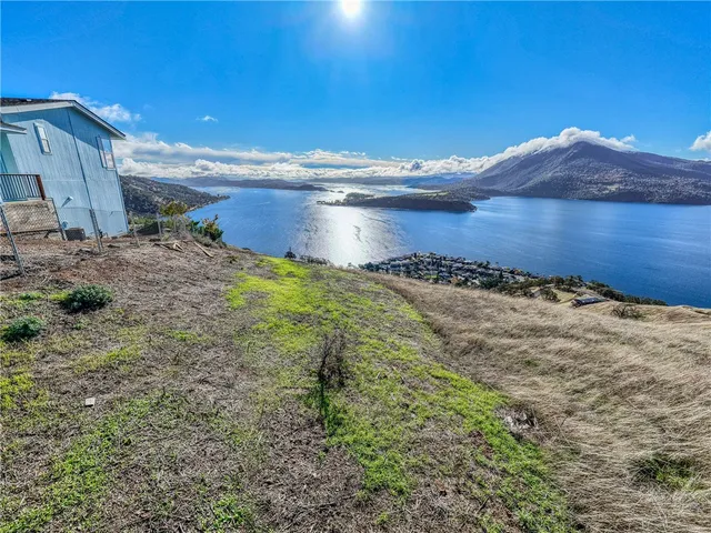 a view of a backyard of a house
