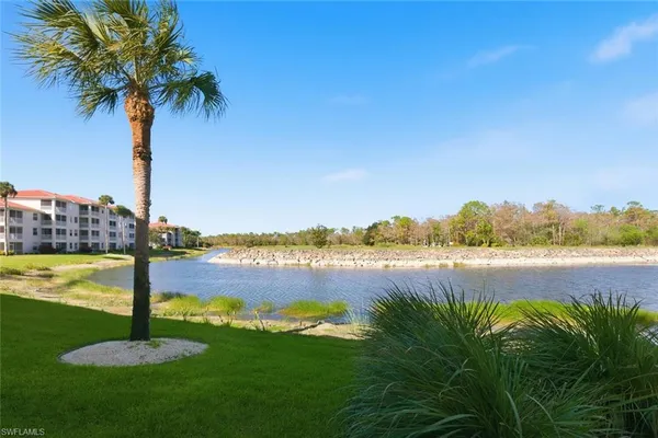 a view of a lake with a city