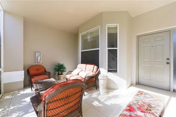 a bedroom with bed and a window