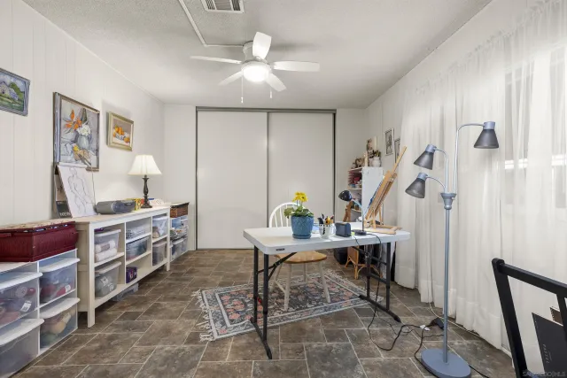 a view of a workspace with furniture