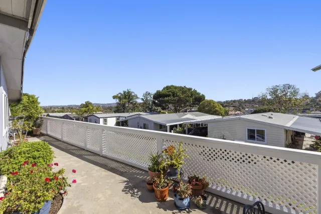 a view of a chairs and table on the terrace