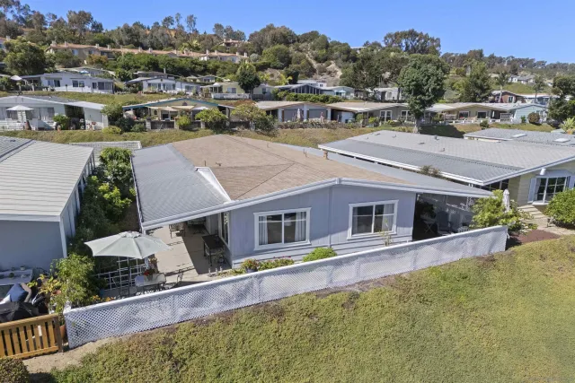 a view of a house with a swimming pool