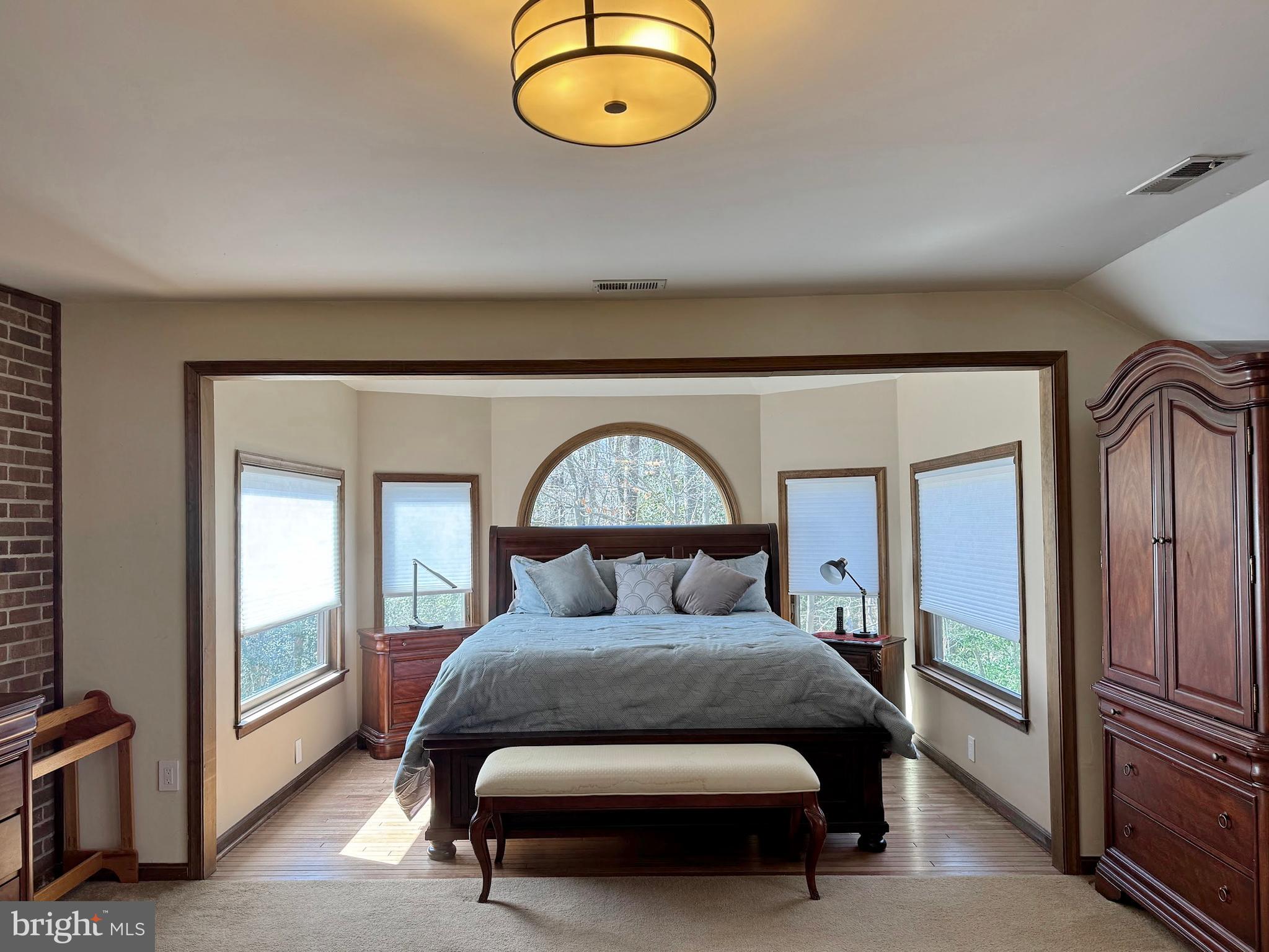 8150 Plowden Drive La Plata, MD 20646 - Photo 39 of 91 a bedroom with a bed and a painting on the wall