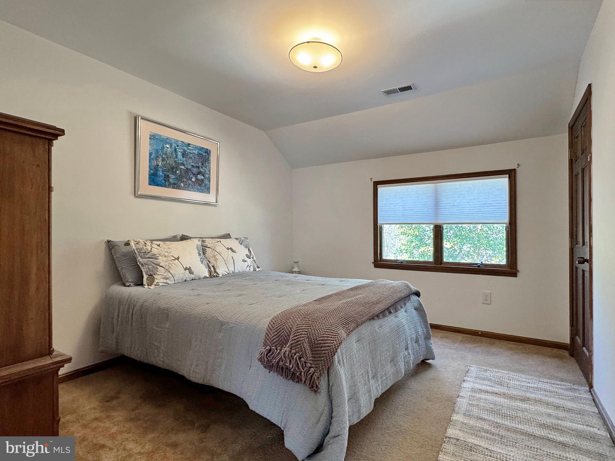 8150 Plowden Drive La Plata, MD 20646 - Photo 60 of 91 a bedroom with a bed and a window