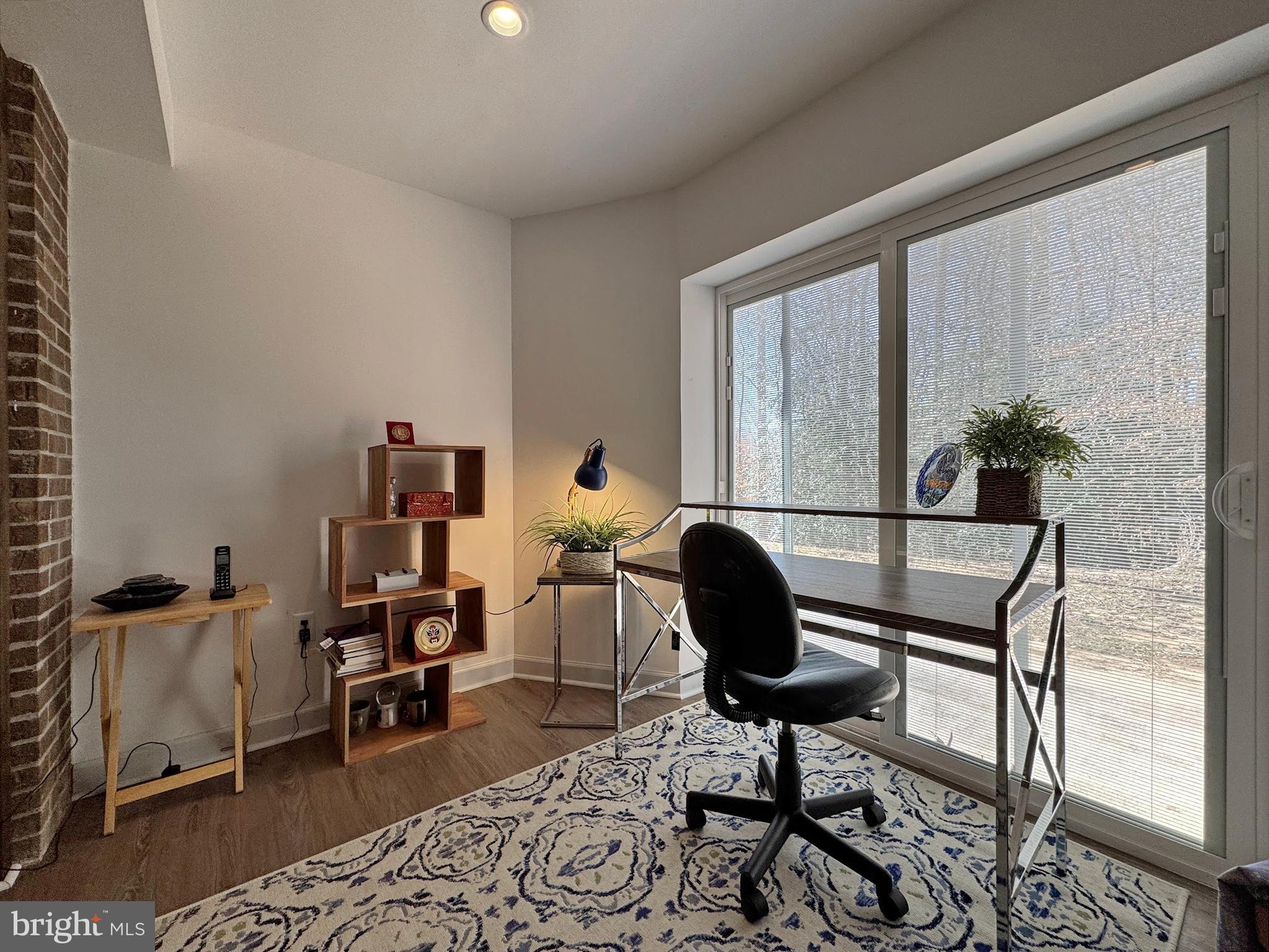 8150 Plowden Drive La Plata, MD 20646 - Photo 72 of 91 a living room with furniture and a potted plant