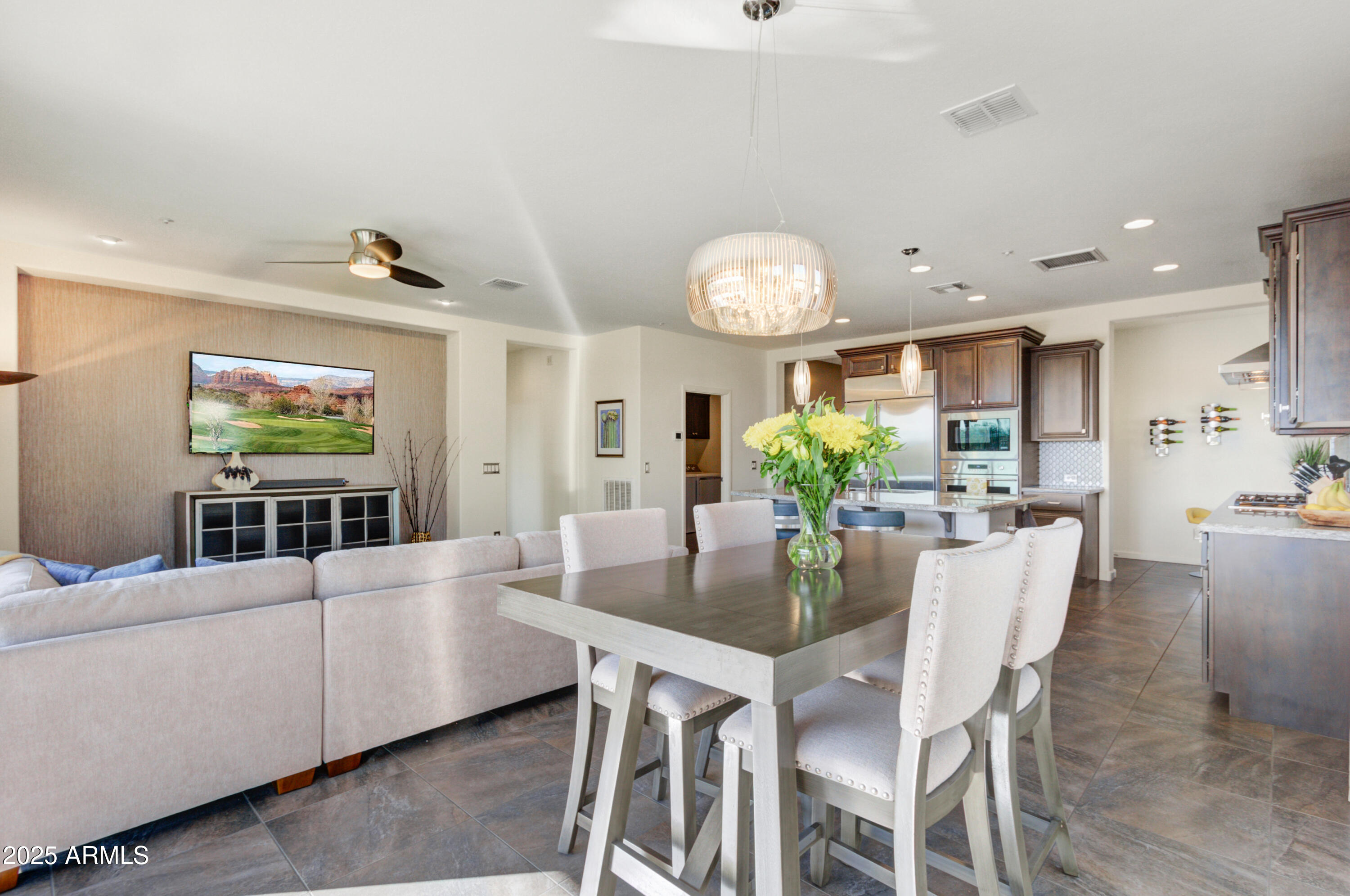 17919 East Slide Rock Drive Rio Verde, AZ 85263 - Photo 10 of 48 a view of a dining room with furniture and wooden floor
