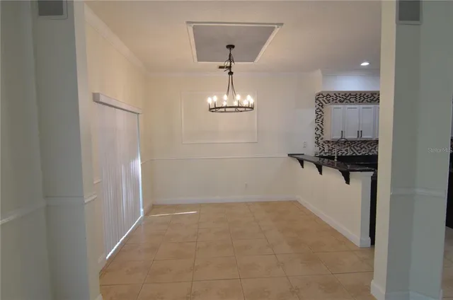 a view of hallway with wooden floor