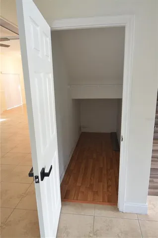 a view of a room with racks on the wall