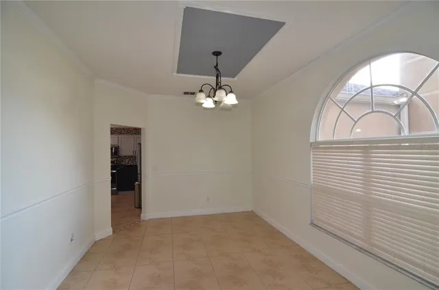 a view of a balcony with wooden floor