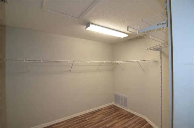 a view of a trees with a yard