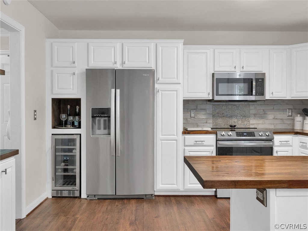 14307 Long Gate Road Midlothian, VA 23112 - Photo 13 of 41 a kitchen with kitchen island a counter space stainless steel appliances and cabinets