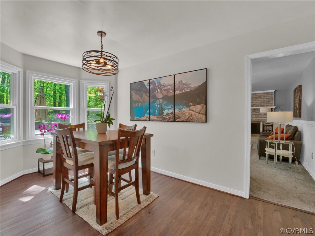 14307 Long Gate Road Midlothian, VA 23112 - Photo 17 of 41 a view of a dining room with furniture window and wooden floor