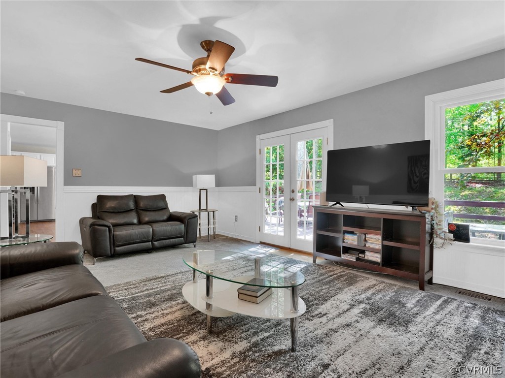 14307 Long Gate Road Midlothian, VA 23112 - Photo 19 of 41 a living room with furniture and a flat screen tv