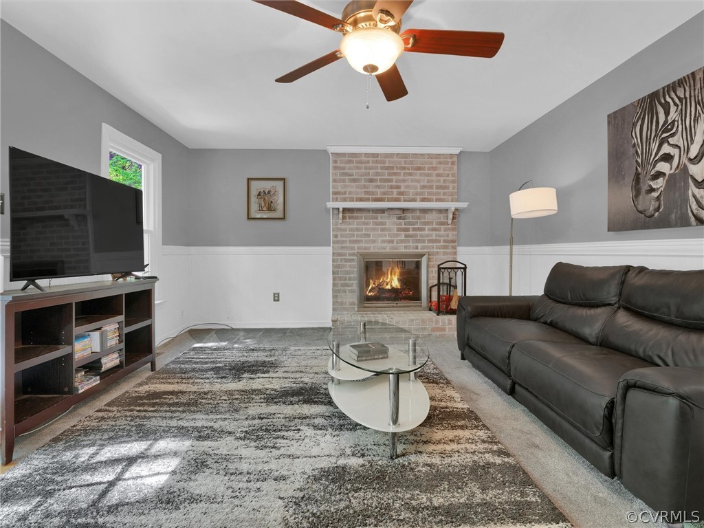 14307 Long Gate Road Midlothian, VA 23112 - Photo 20 of 41 a living room with furniture and a flat screen tv