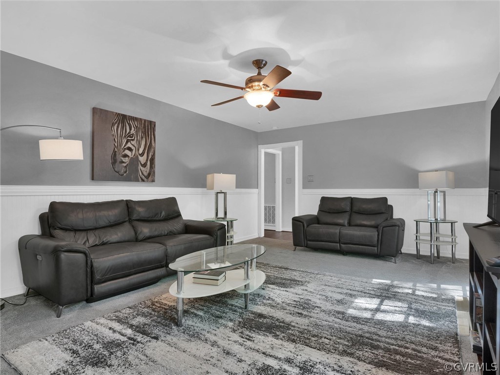 14307 Long Gate Road Midlothian, VA 23112 - Photo 21 of 41 a living room with furniture ceiling fan and a lamp