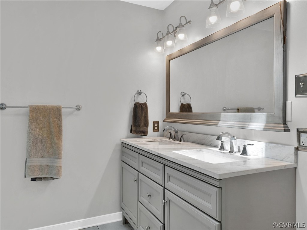 14307 Long Gate Road Midlothian, VA 23112 - Photo 25 of 41 a bathroom with a sink and a mirror