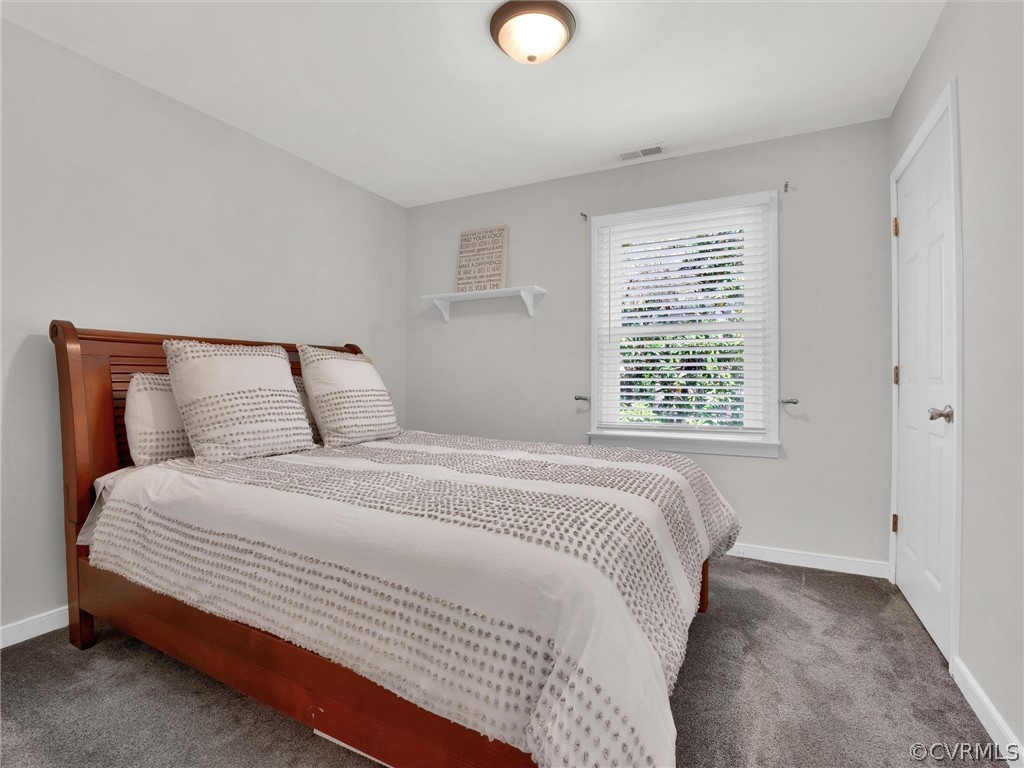14307 Long Gate Road Midlothian, VA 23112 - Photo 29 of 41 a bedroom with a bed and window