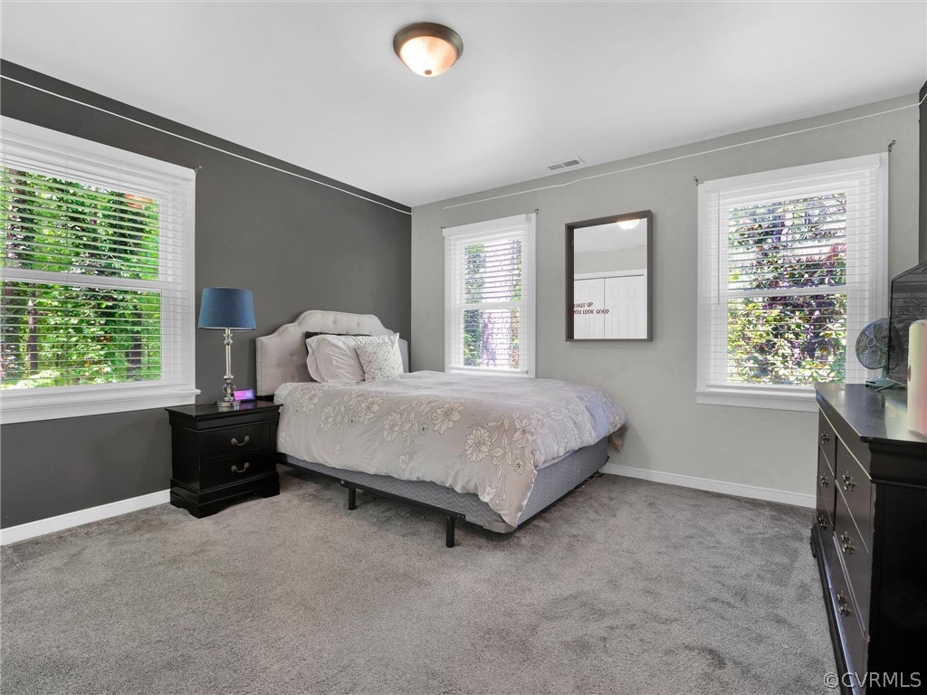 14307 Long Gate Road Midlothian, VA 23112 - Photo 31 of 41 a bedroom with a bed and a window