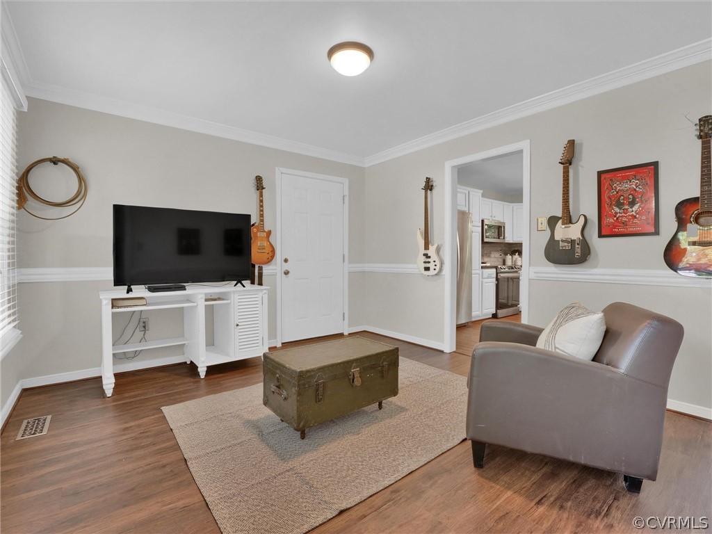 14307 Long Gate Road Midlothian, VA 23112 - Photo 8 of 41 a living room with furniture and a flat screen tv