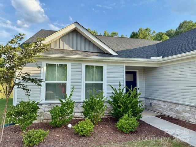 505 Grandiflora Avenue Lancaster, SC 29720 - Photo 11 of 16 a front view of a house with garden