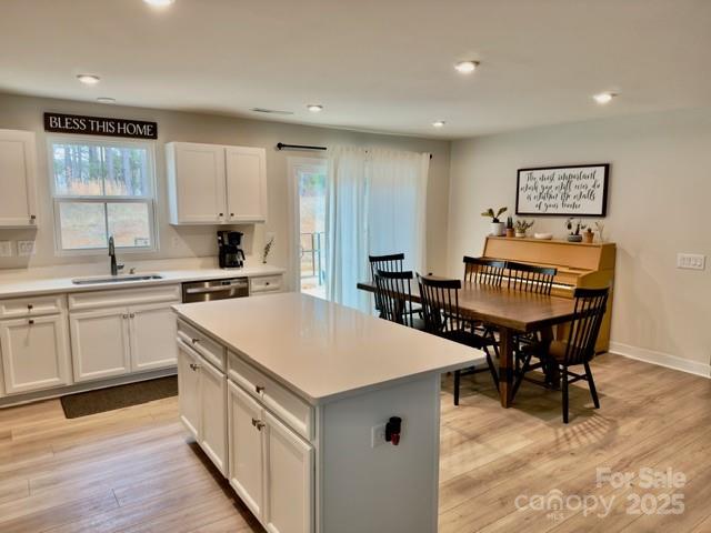 505 Grandiflora Avenue Lancaster, SC 29720 - Photo 5 of 16 a kitchen that has a table and chairs in it