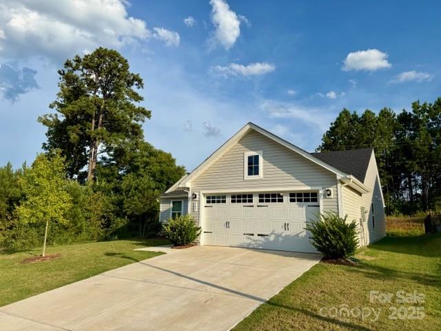 505 Grandiflora Avenue Lancaster, SC 29720 - Photo 10 of 16 a view of a house with a yard