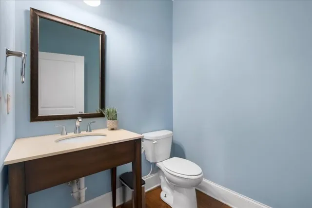 a room with a large window and furniture