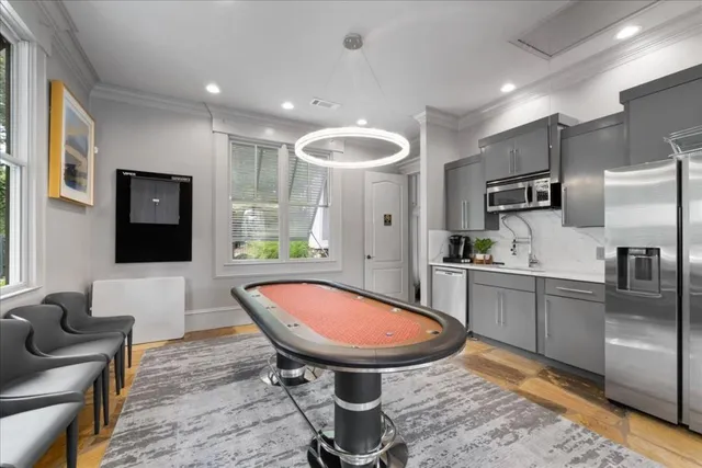 a living room with furniture or fireplace and a large window