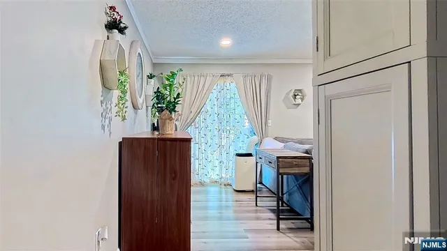 a view of livingroom with furniture and wooden floor