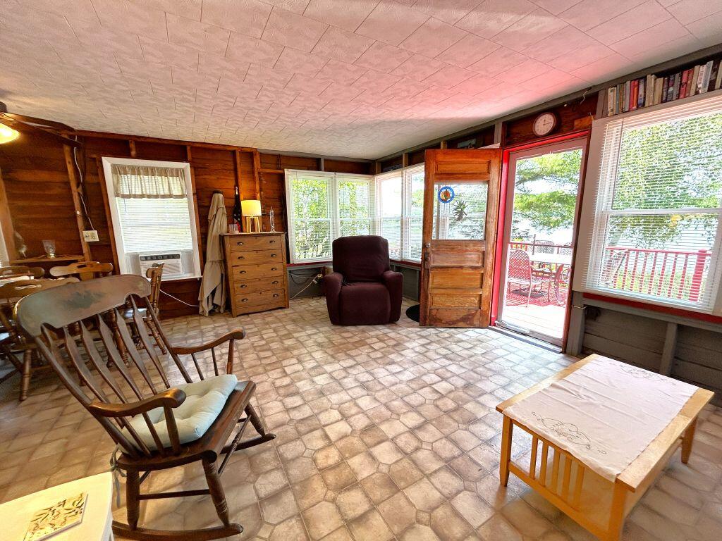 100 Spearin Shores Road Albion, ME 04910 - Photo 15 of 26 Living room to deck