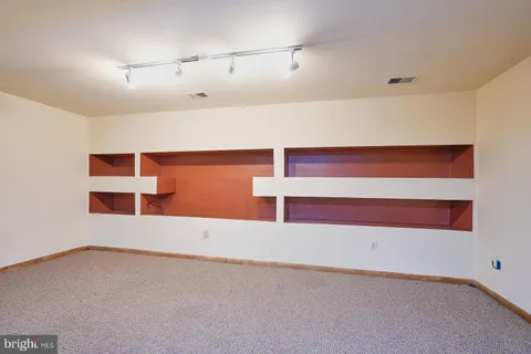 a room with a ceiling fan