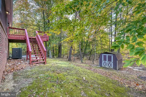 a sign board with a yard