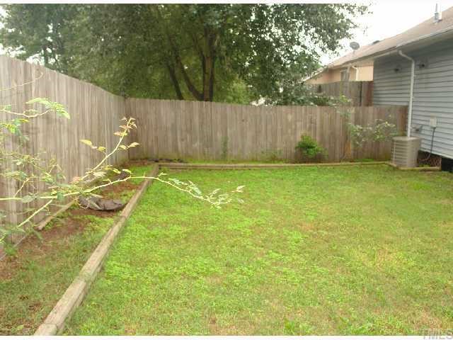 4412 Roller Court Raleigh, NC 27604 - Photo 12 of 12 a view of an outdoor space and a yard