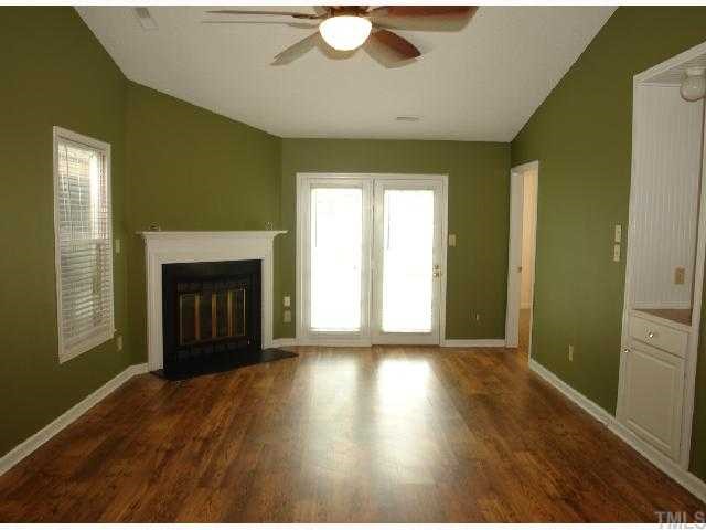 4412 Roller Court Raleigh, NC 27604 - Photo 3 of 12 a view of an empty room with window and fire place
