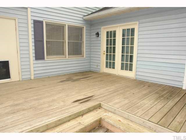 4412 Roller Court Raleigh, NC 27604 - Photo 10 of 12 a view of a backyard of a house