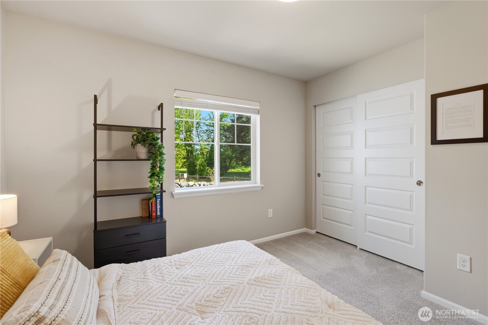 19432 9th Avenue Southeast Bothell, WA 98012 - Photo 23 of 33 a bedroom with a bed and a window