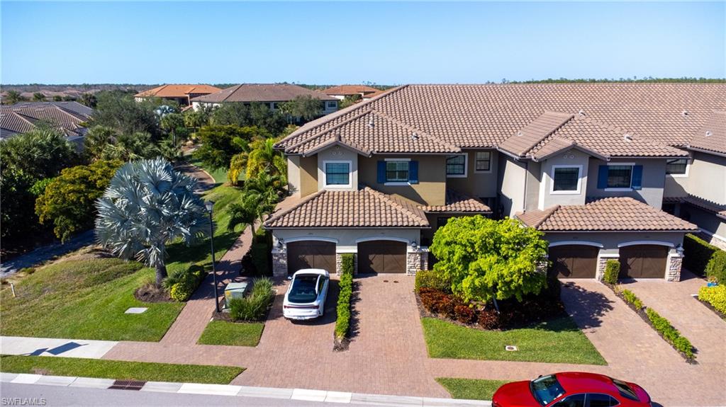9684 Montelanico Loop, Unit 101 Naples, FL 34119 - Photo 31 of 49 View of mediterranean / spanish house