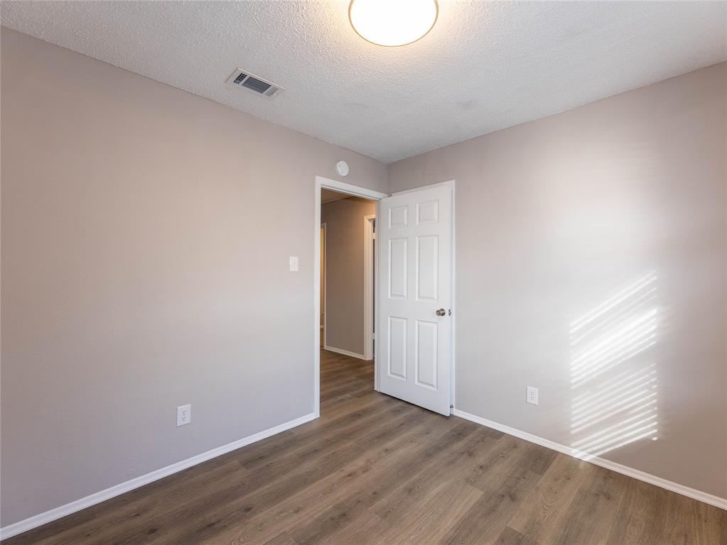 1932 Mars Drive Garland, TX 75040 - Photo 15 of 27 a view of an empty room