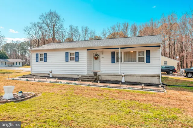 a view of a house with a swimming pool
