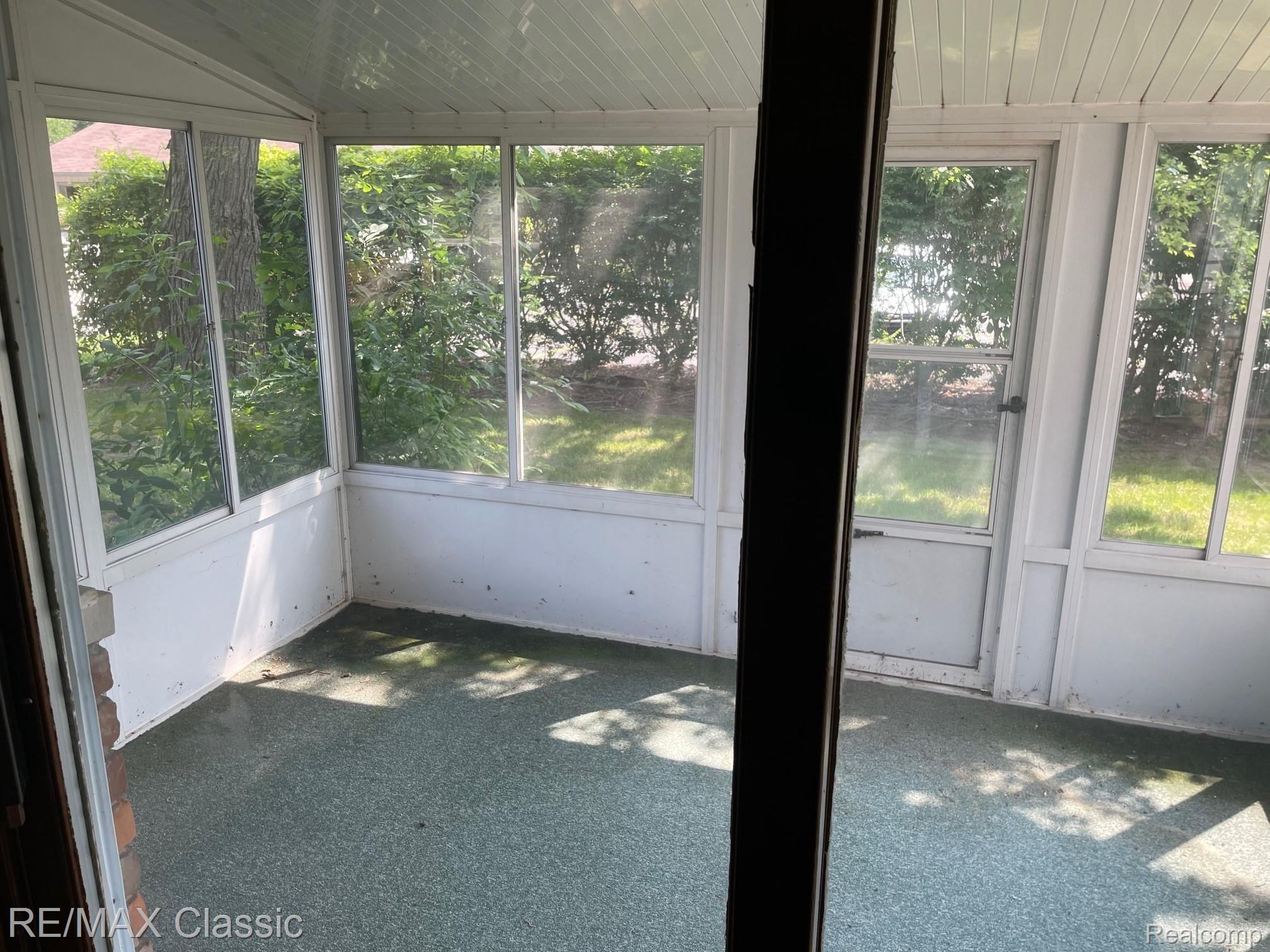 8559 Belleville Road Belleville, MI 48111 - Photo 18 of 23 screened in porch off Dining Room/Family room area