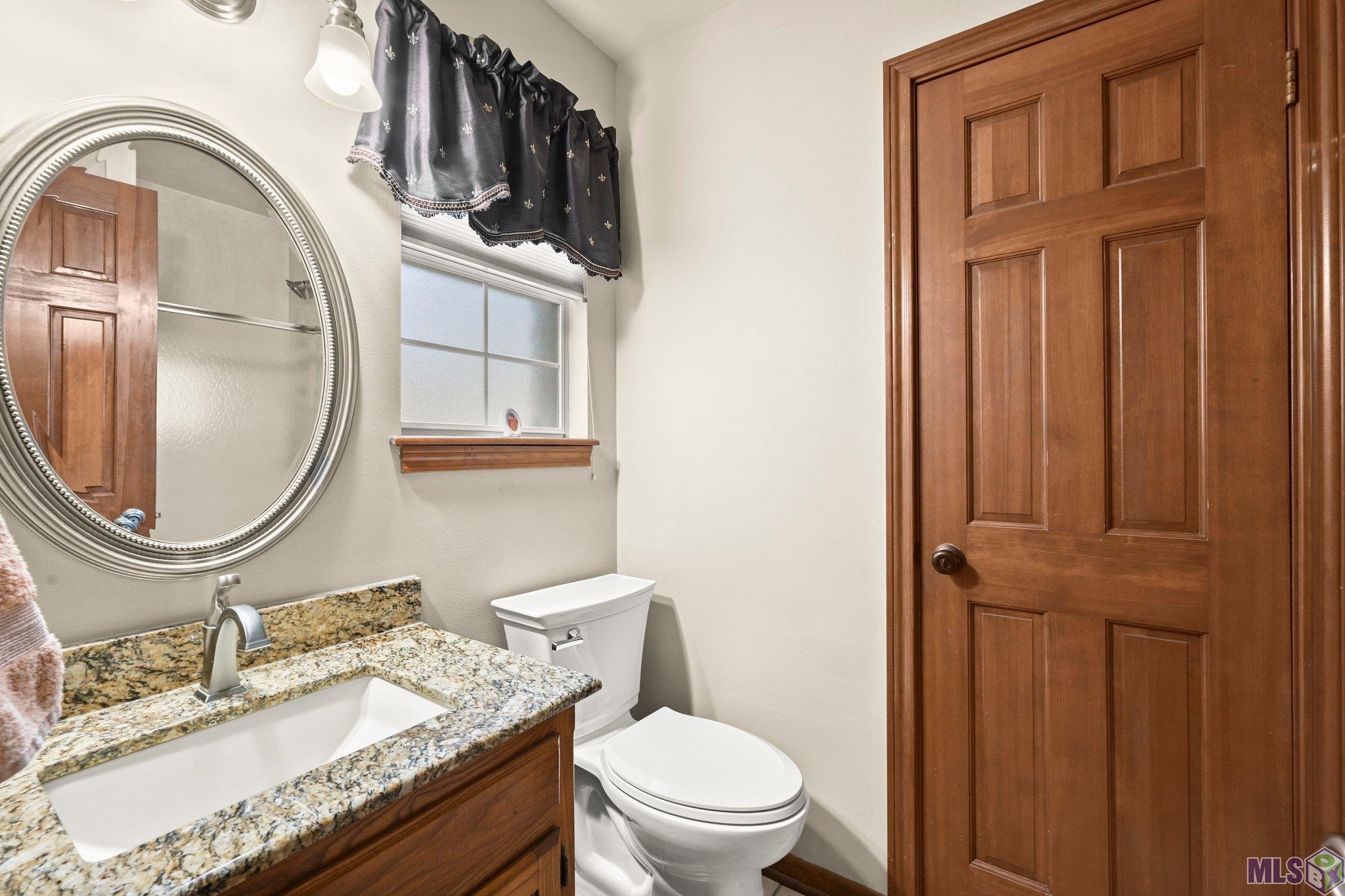 8533 Briarwood Place Baton Rouge, LA 70809 - Photo 22 of 30 Guest bath downstairs by Pool