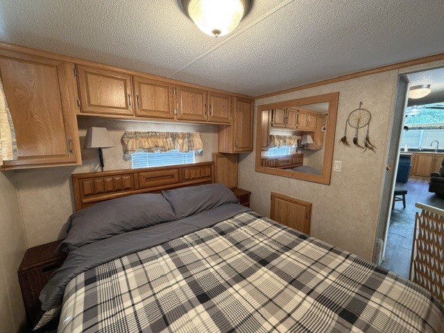 2795 East 28th Road Marseilles, IL 61341 - Photo 32 of 75 a bedroom with a bed and a window