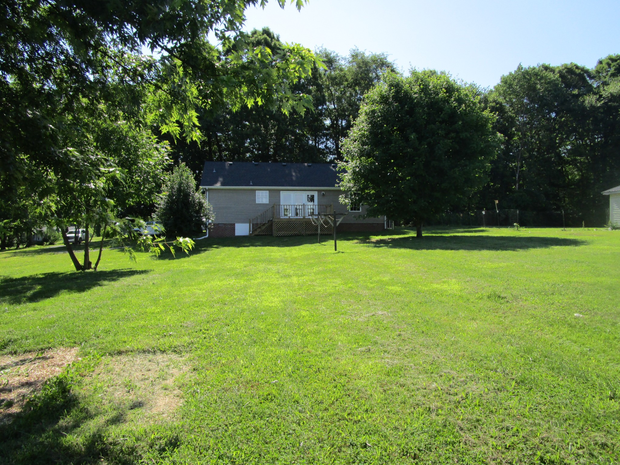 619 Lear Road Portland, TN 37148 - Photo 16 of 43 a view of a house with a yard