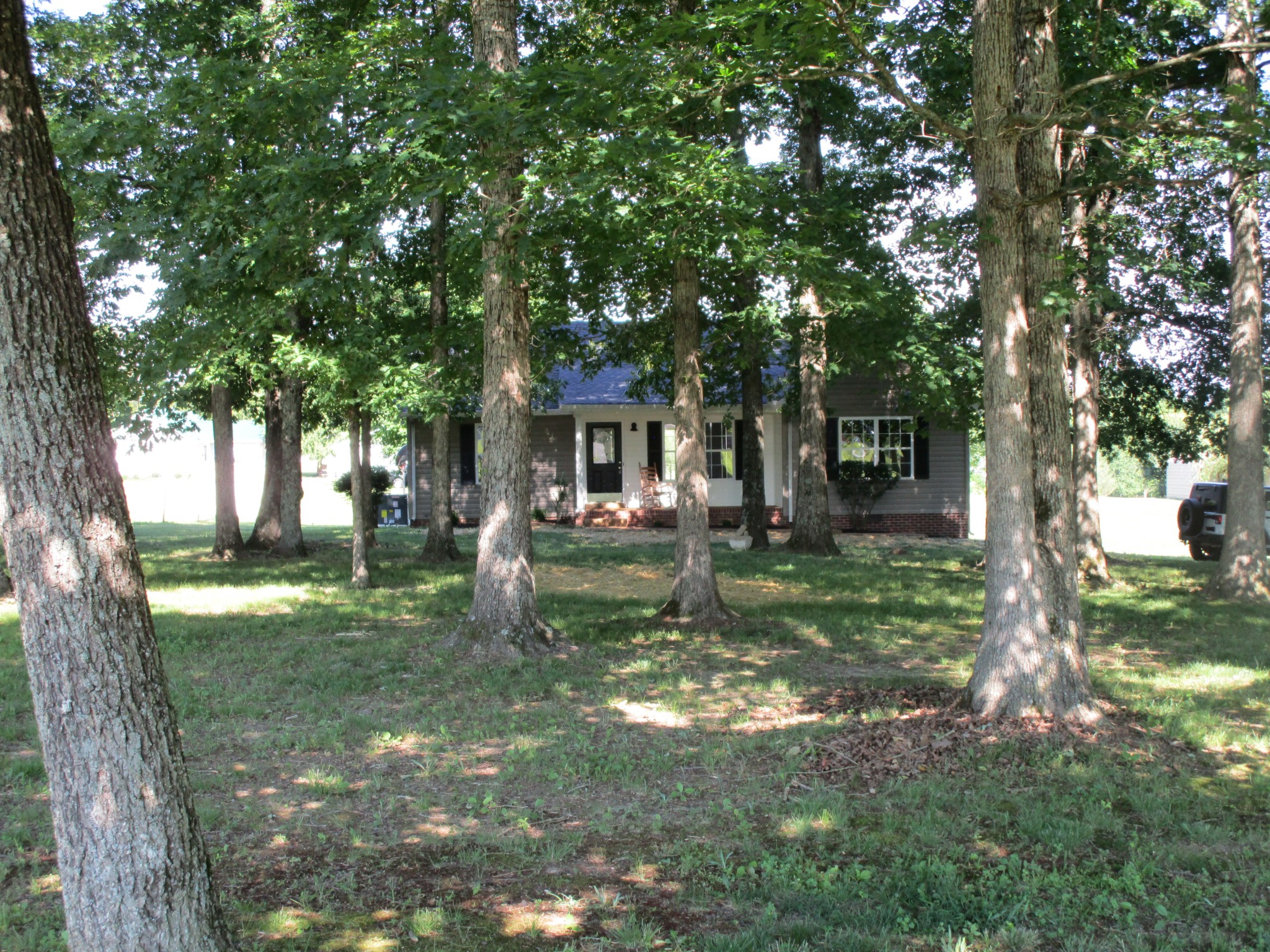 619 Lear Road Portland, TN 37148 - Photo 2 of 43 a front view of a house with garden