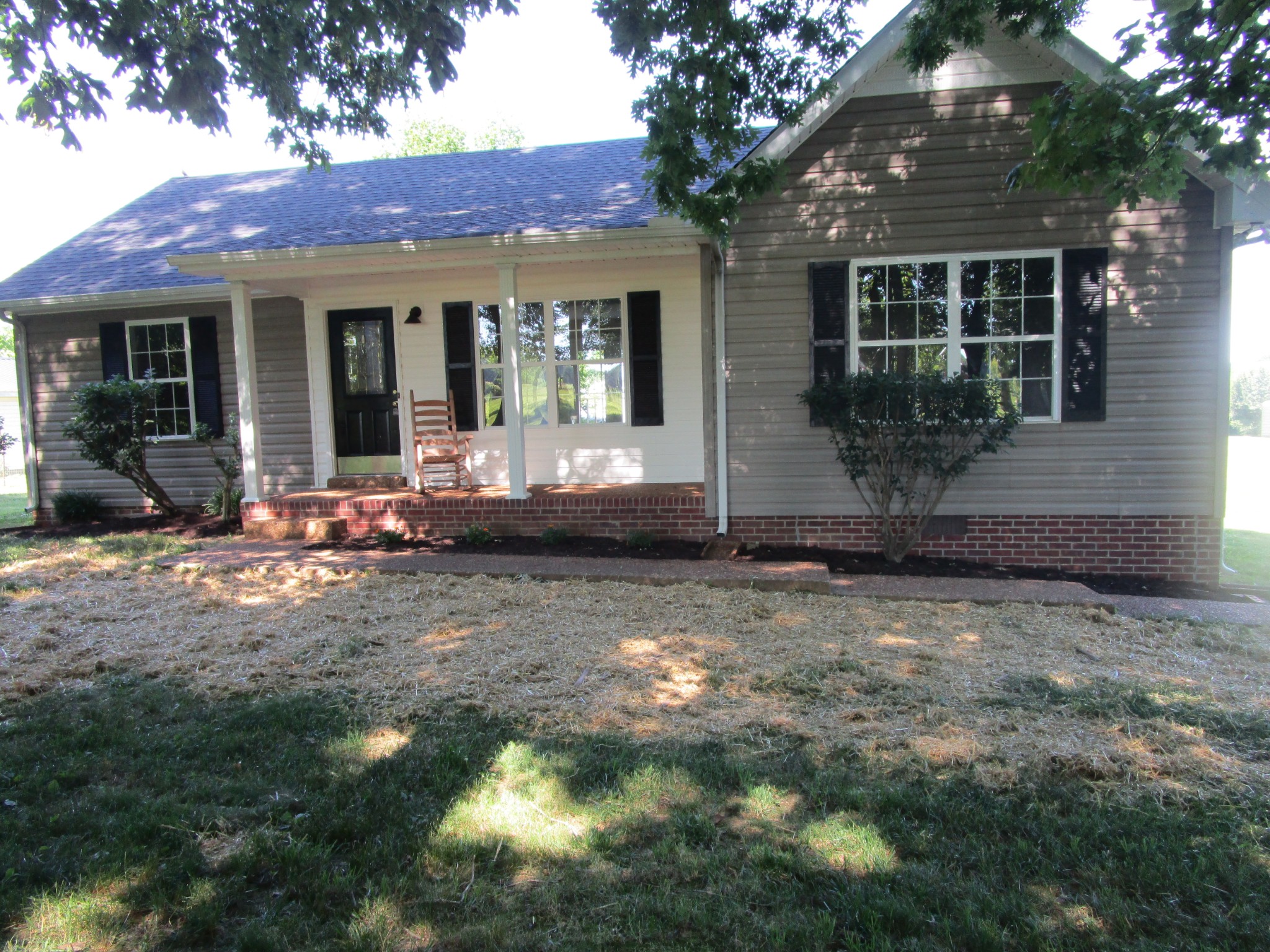 619 Lear Road Portland, TN 37148 - Photo 5 of 43 a front view of a house with garden