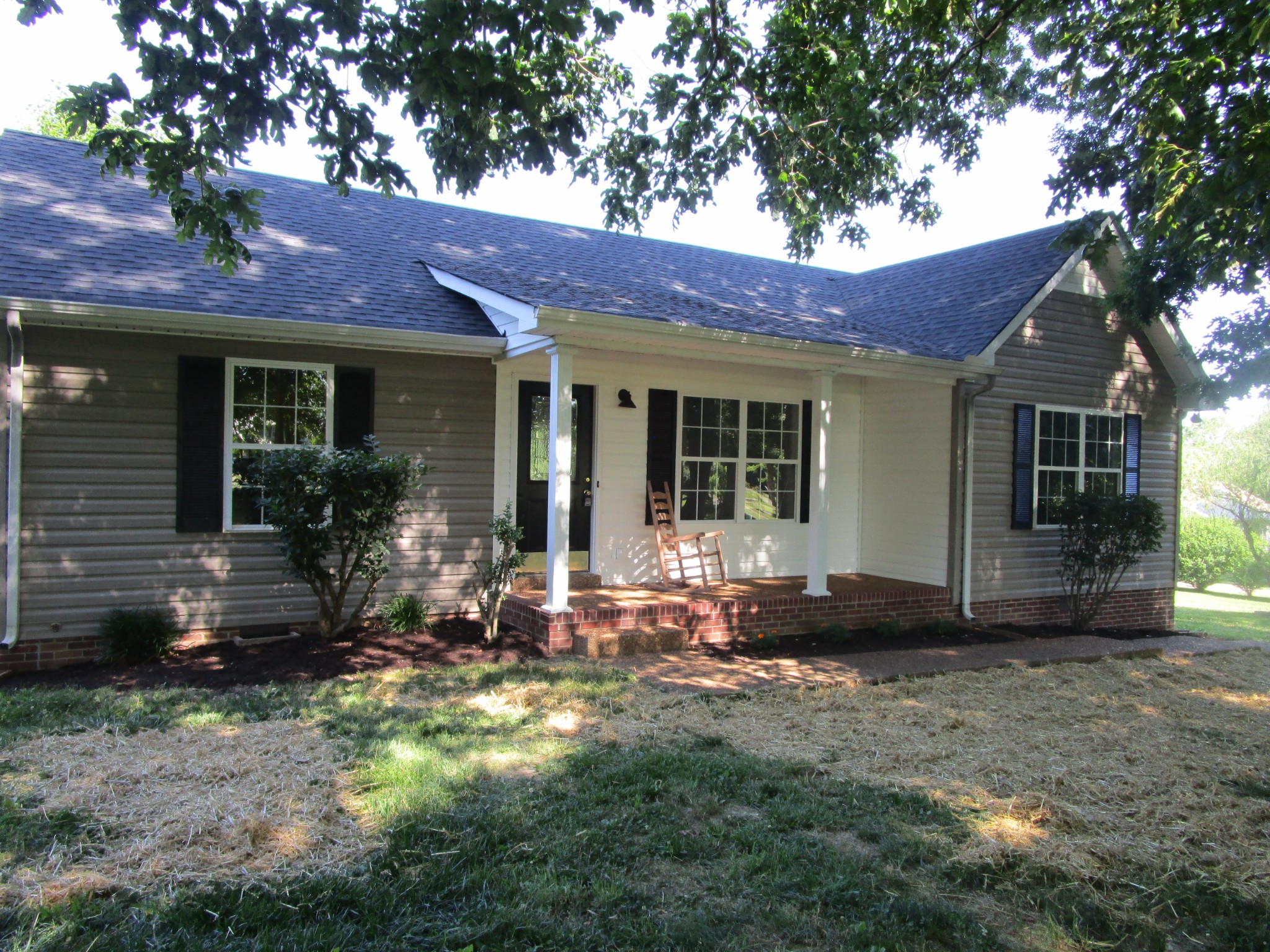 619 Lear Road Portland, TN 37148 - Photo 6 of 43 a front view of a house with a yard