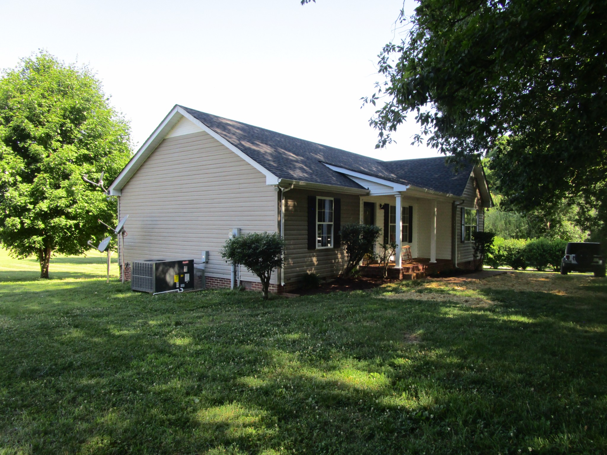 619 Lear Road Portland, TN 37148 - Photo 8 of 43 a view of a house with a yard and sitting area