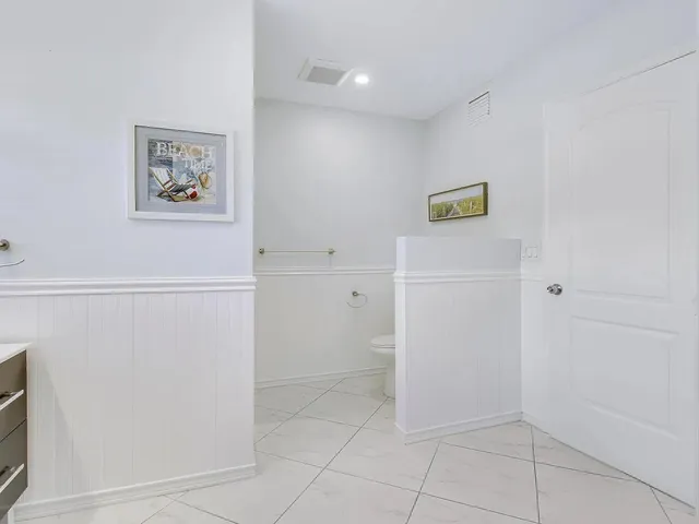 a view of a hallway with closet