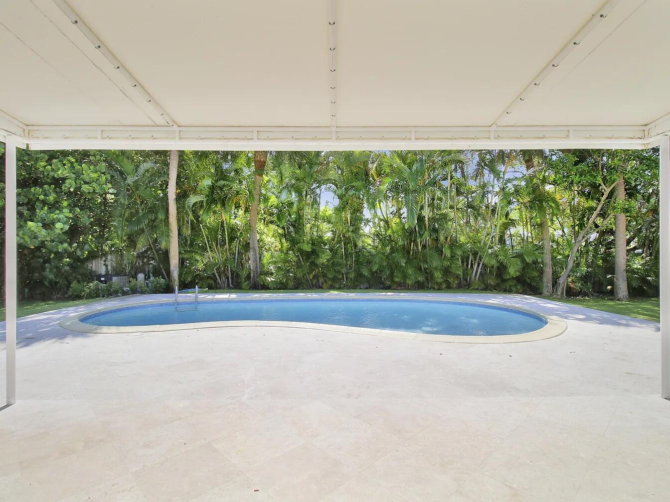 1310 Manor Drive Singer Island, FL 33404 - Photo 23 of 25 a view of a back yard from a room